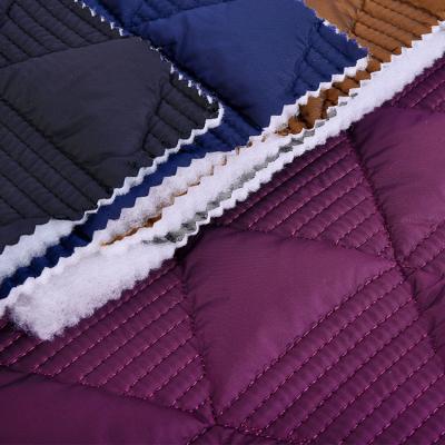 China Popular waterproof nylon fabric 360T breathable as shell fabric triangle pattern quilting fabric for women coat for sale