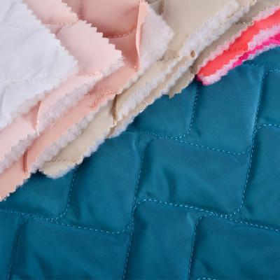 China Competitive price hot multi colors midium waterproof weight waterproof quilted fabric suitable for vest in spring and fall for sale