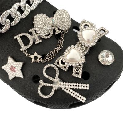 China Horizontal Designer Shoe Charms Wholesale Bling Croc Layout Charm Rhinestone Metal Designer Hoop Charm Diamond Shoe Decoration for sale