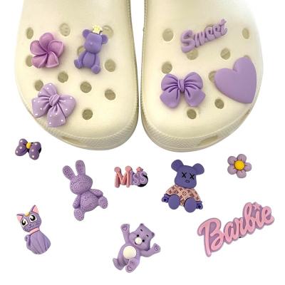 China Designer Charms New Arrival Purple Charms Promotional Designs Available Croc Charms PVC Shoes Charm Decoration For Croc Diy Gift for sale