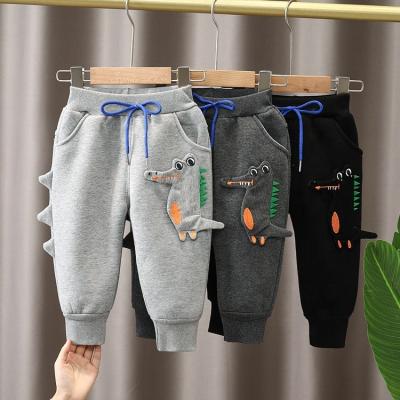 China Keep Bottoms Autumn Winter Clothes Children's Bottoms Sports Pants Kids Dinosaur Baby Boy Casual Drawstring Sweatpants for sale