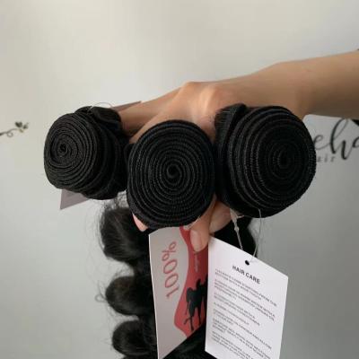 China 100%Human Hair Brazilian Virgin Hair Natural Black Color Loose Wave Bundles for sale