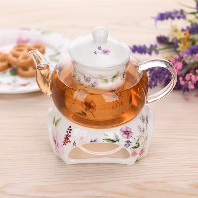 China Viable Flowers Glass Teapot With Customized Ceramic Teapot Warmer for sale