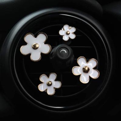 China Car Air Freshener Gel Car Air Freshener Black Daisy Flower Different Colors Various Smells Car Air Freshener Gel Black Car Perfume Led Clip for sale