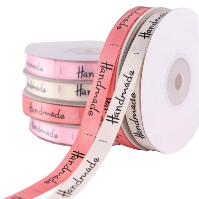 China Popular Logo 10MM width double face satin ribbon with custom printed logo printed ribbon for sale