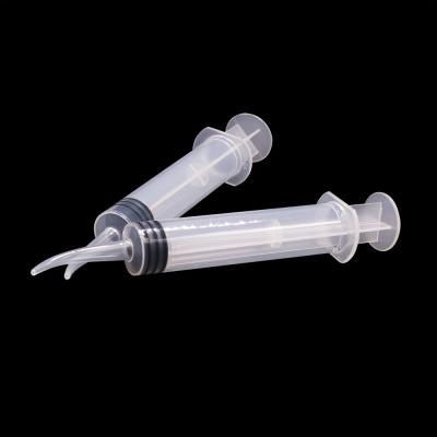 China Disposable Plastic Curved Tip Rubber Head 12ml Luer Lock Dental Syringe for sale