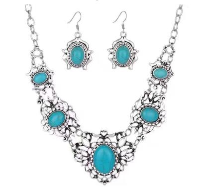 China Vintage Retro Hot Sale Ladies Girl Turquoise Necklace Earrings Costume Flower Silver Cut Out Women Jewelry Set for sale