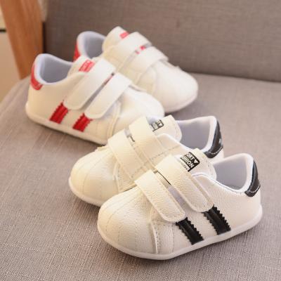 China 2022 Wholesale White Breathable Canvas Pre Walker Baby Shoes Shell Newborn Soft Single Girl Lovely Toddler Shoes for sale