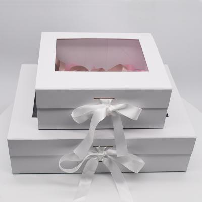 China Recycled Materials Folding Magnetic Handmade Box Bespoke White Rose Flowers Wedding Gift Packaging Boxes With Custom Shape Window for sale