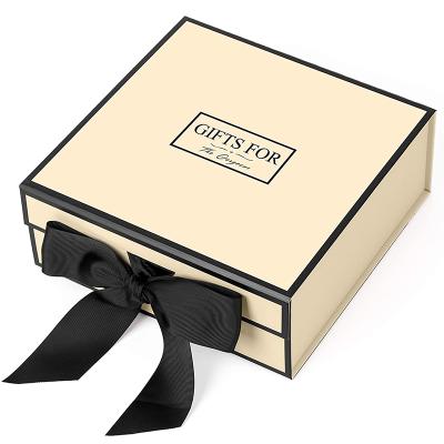 China Recycled Materials Adjust Flap Premium Closure Printed Luxury Cosmetic Gift Packaging Box With Magnet And Ribbon Bow for sale