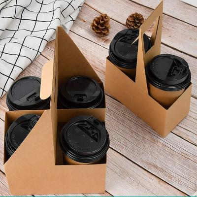 China Recycled Materials Printed Disposable Paper Coffee Cup Handle Carrier 16oz Factory Custom Logo Printed Disposable Take Away Cardboard Cup Holder for sale