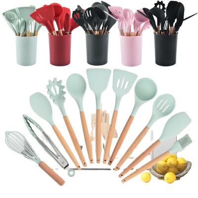 China Silicone 12 Pcs Kitchen Instruments Non Stick Sustainable Heat Resistant Kitchenware Cooking Tools With Wooden Handle for sale