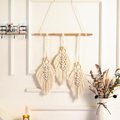 China Chic Woven Handmade Bohemian Woven Tapestry Wall Hanging Minimalist Feather Macrame Boho Leaf Tassels Decoration for sale