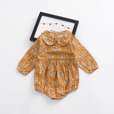 China Latest 100% Cotton Girls Rompers Fashion In Turmeric Flower Baby Long Sleeved Baby Romper Jumpsuit Newborn Babies Clothes for sale