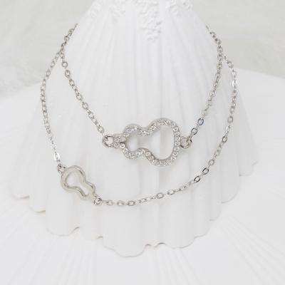 China CLASSIC High Quality Tasty Adjustable Round Chain Elegant NS Ribbon Charm Bracelet for sale