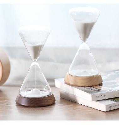 China Unique Minimalist Custom Sand Timer Clock 10 Minutes Synchronize To 30 Minutes Hourglass Hour Glass Customized Logo Wooden Base Sand Glass for sale