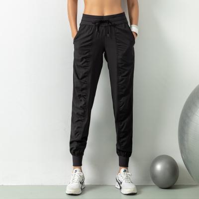 China Breathable Sportswear Stack Cargo Pant Sports Women Track Stacked Joggers Pants With Side Pockets for sale