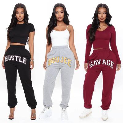 China QUICK DRY Women Clothes Letters Printed Sleeve Pants Tracksuit Teams Womens Printing Pants Plus Size Clothing for sale