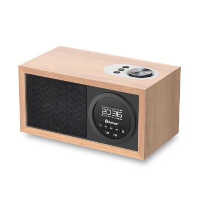 China Dual USB/TF Home Radio Wooden Wireless Playback Speaker Radio Alarm Clock for sale