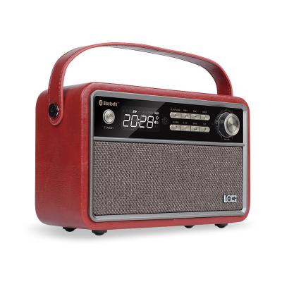 China Wireless wooden BT speaker with alarm clock /USB and TF card playback/FM radio for sale