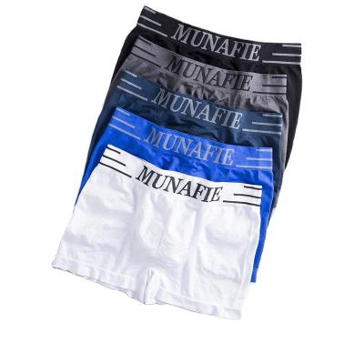 China High-elastic Munafie Boxer Fierce Men's Ice Breathable Silk Single Mid-Rise Underwear Three-bar Seamless Briefs for sale