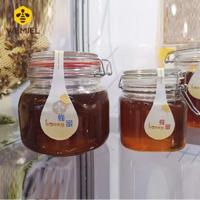 China Chinese supplier 1kg bee honey 1kg staple glass raw glass jar staple jar for sale