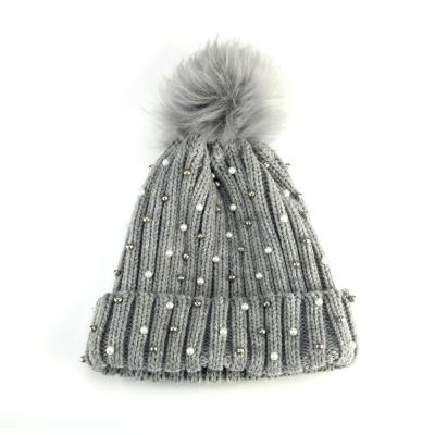 China COMMON Nice Winter Knitted Hats Bead Warm And Soft Knitting Hat Cap For Female for sale