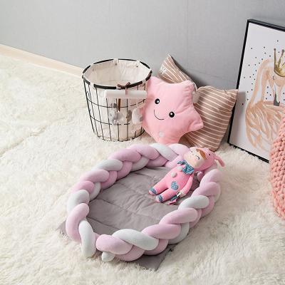 China Viable Baby Crib Knotted Braided Pillow Naper Nursery Decor Infant Crib Bumper Pink-White-Pink for sale