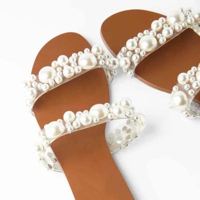 China Ladies Open Toe Leisure Beach Light Pearl Sandals Women's Transparent Pearl Slides New Summer Fashion Trend Design Flat Diamonds Slippers for sale