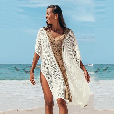 China Women Summer V-neck Sweater Kaftan Beach Windproof Bikini Cover Up Sexy Hollow Out Going Out Blouse for sale