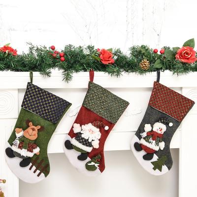 China Promotional Nonwoven Fabric Christmas Gift Bags Christmas Stocking Tree Ornaments Stockings For Christmas Decoration for sale