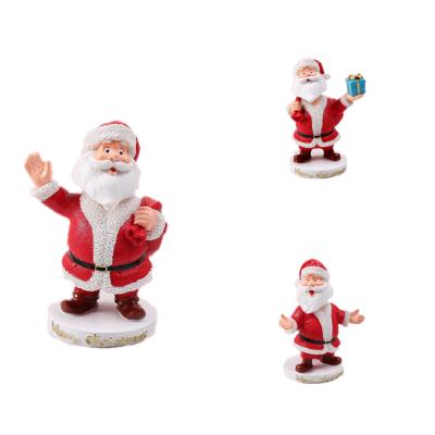 China Europe Resin Crafts Cartoon Santa Claus Doll Fun Decorative Ornaments for sale