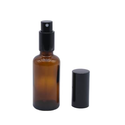 China Cosmetic Packaging Spray Bottle 10ml 50ml 100ml Amber Glass Perfume Bottles With Black Pump Sprayer Cap for sale