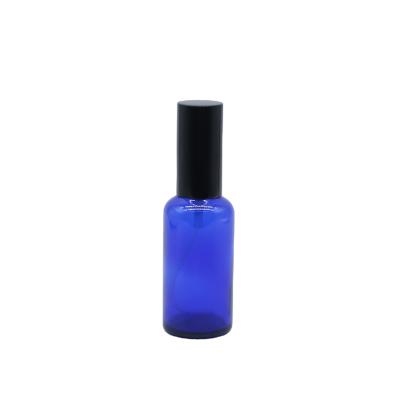 China Factory direct sales 30ml 50ml 100ml cosmetic round blue color glass perfume bottle with sprayer pump and serum pump for sale