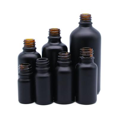 China Cosmetic Empty Serum Bottles 30ml Matte Black Essential Oil Dropper Round Glass Bottle for sale