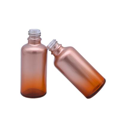 China Pink Gradient Cosmetic Oil Packaging Bottles 50ml Essential Oil Glass Dropper Bottle for sale