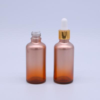 China Cosmetic Wholesale 50ml Serum For Pink Gradient Color Essential Oil Glass Dropper Bottle for sale