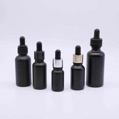 China Factory direct sales cosmetic straight cylinder 50ml mute black empty glass droppers, black matte refined oil bottles for sale