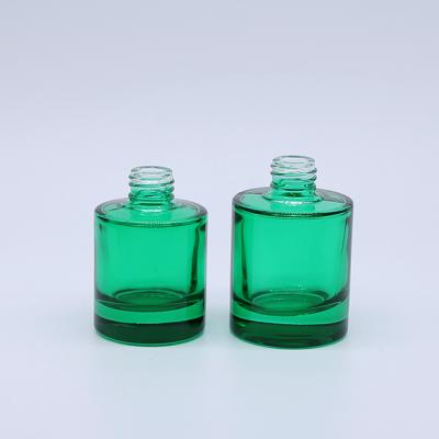 China New Designs 30ml 50ml Cosmetic Serum Oil Dropper Bottle Glass Essential Oil Green Glass Bottle for sale