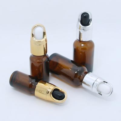 China Cosmetic 10ml amber refined oil bottle with flower basket and dropper bottle packing bottle for sale