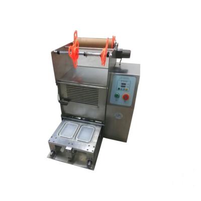 China High Capacity Top Automatic Continuous Food Tray Sealing Machine For Food Packaging Vacuum Fast Food Sealers for sale