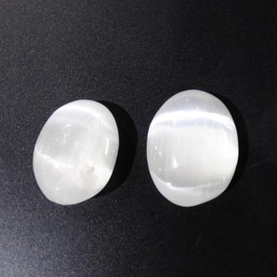 China China high quality natural white selenite hand crafted selenite palm stone for healing for sale