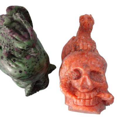 China China Wholesale Natural High Quality Hand-carved Red Dragon Sun Stone Zosite with Skulls for Home Decoration for sale