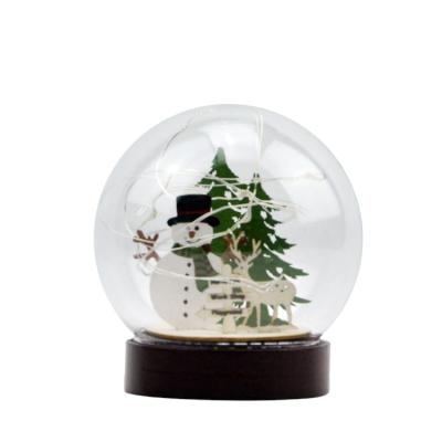 China China factory wholesale glass globe with wooden snowman figure and tree for sale