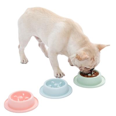 China Non-slip Plastic Pet Food Bowl PP Pet Stored Products Dog Luxury Pet Wheels Portable Dog Slow Feeder for sale