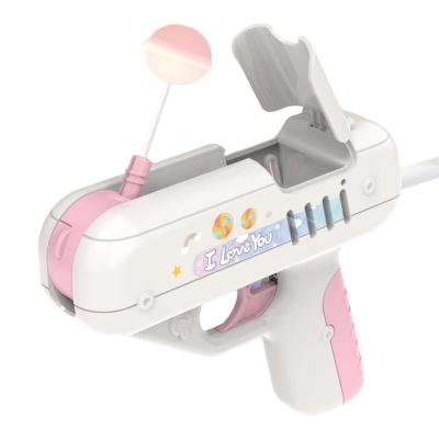 China Bubbling Toy Lollipop Gun Fun Mini Plastic Candy Gun Plastic Candy Toy for sale