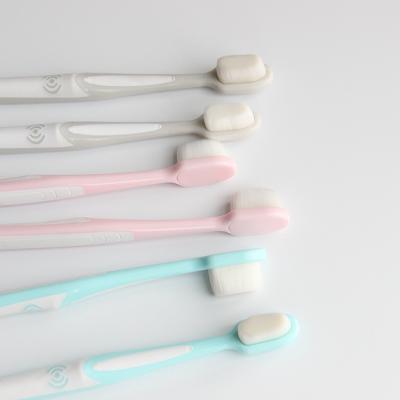 China New design toothbrush 10000 30000 ultra fine and soft bristle for adult à venda