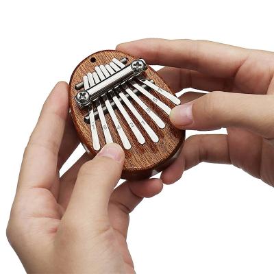 China With Lanyard Accessory 8 Mini Kalimba Exquisite Finger Thumb Lead Piano Promotion Gift Musical Marimba Good For Kids for sale