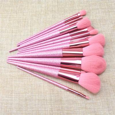 China Angular Blush 12pcs High Quality Frosted Pink Glitter Makeup Brush Set Super Soft Hair Makeup Blending Brush for sale