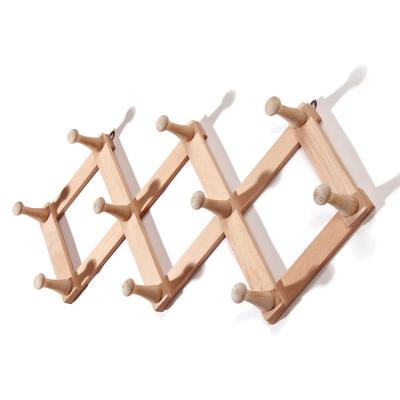 China Creative Wall Mounted Folding Hanger Living Room/Bedroom Amazon Beech Wooden Coat Hook Rack for sale